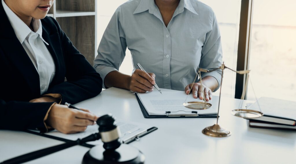 Business lawyer is currently counseling the client's trial at the lawyer office.